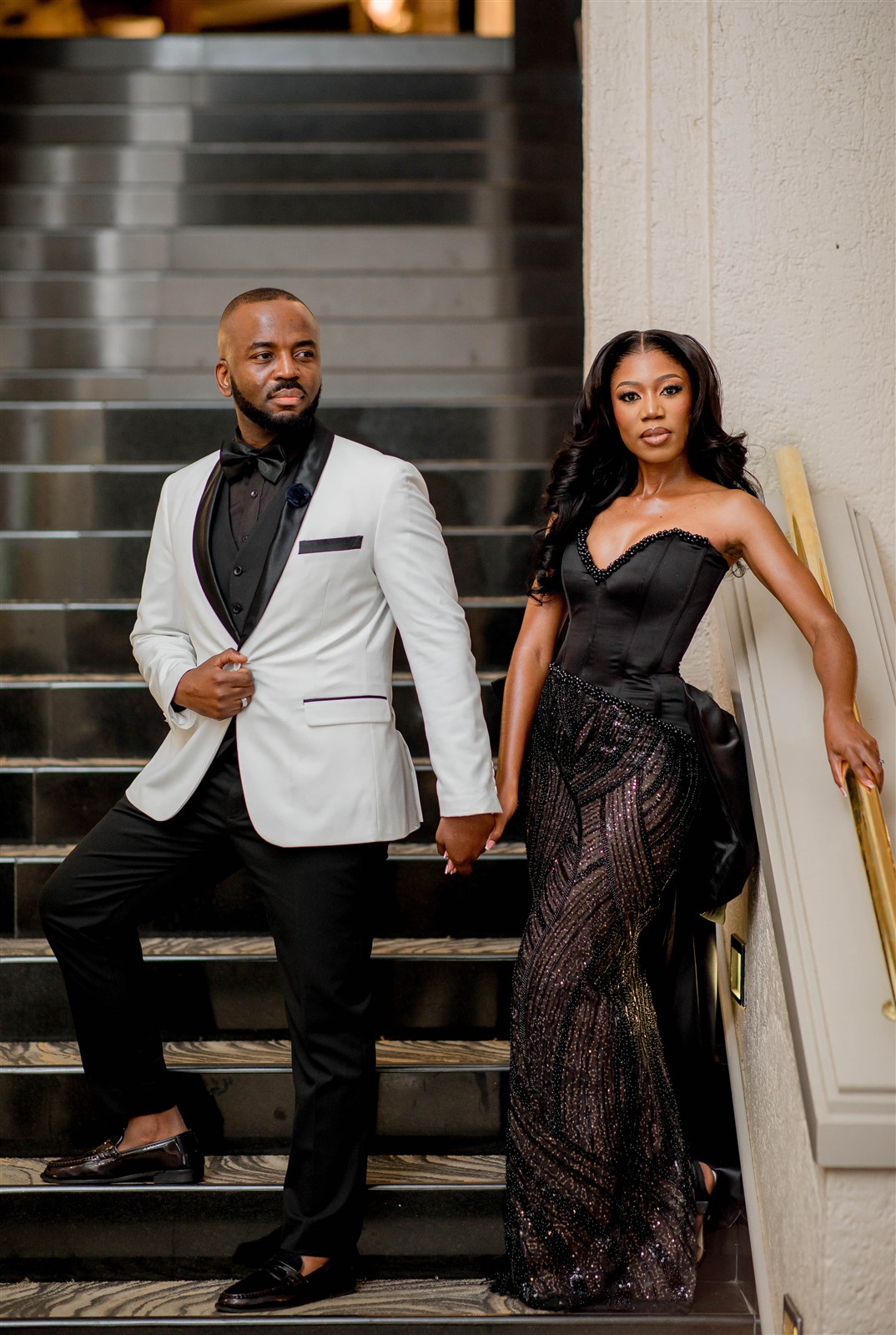 Ndauda and Shiwa standing together on the stairs