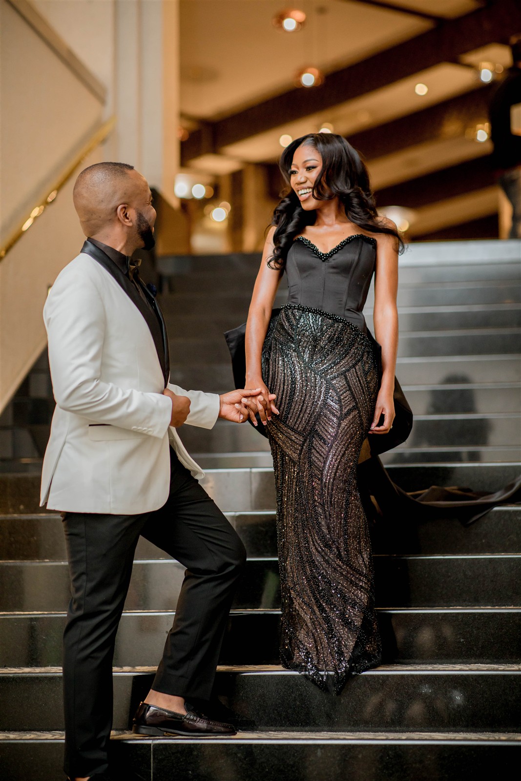 Ndauda and Shiwa by the staircase